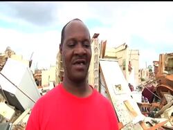 Search and rescue teams in Tuscaloosa, Alabama, continue to comb through the debris of Wednesday's deadly tornadoes. President Barack Obama said he would travel to Alabama on Friday to view storm damage. News Clip