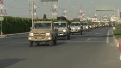 Convoy of Peshmerga fighters leaves Irbil en route for Kobani News Clip