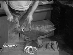 1953: CUSTOM SHOES: Greentree Stable blacksmith Gilbert Stelling making thoroughbred racehorse horseshoes, heating, shaping. Trainer John Gaver Sr. walking in, SOT asking if ready to shoe Oak Tree, Gilbert taking aluminum shoes to horse in stable. Instructional Video
