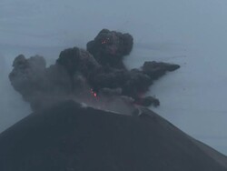 Eruption at dusk blasts ash, glowing lava and lightning from volcano, Krakatoa, Indonesia, November 2010 Stock Footage