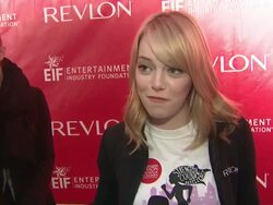 INTERVIEW: Emma Stone talks about what inspired her to be apart of the EIF Revlon Run/Walk.  Mentions her mother's fight against cancer and walking with her Stock Footage