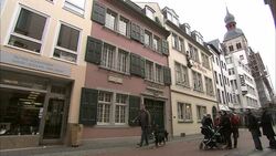 Pedestrians pass shops in Frankfurt, Germany. Stock Footage