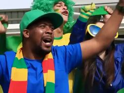 Close up of brazilian fans cheering Stock Footage