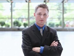  MS Businessman standing with arms crossed / Seattle, Washington, United States Stock Footage