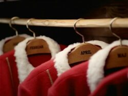 PAN, CU, SELECTIVE FOCUS,  man putting Santa coat in wardrobe, Slovenia Stock Footage