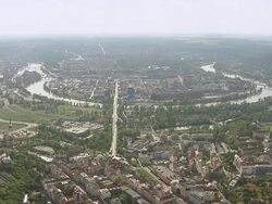 WS AERIAL View of city with traffic on city streets / Prague, Czech Republic Stock Footage