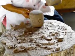 hand use wood hammer hitting tree fiber Stock Footage