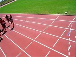 MS high speed Top view relay athletes passing on baton, Australia Stock Footage