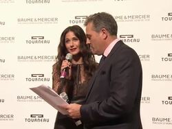 PRESENTATION: Emmanuelle Chriqui and Rudy Chavez announce auction winner Lisa Pavin  Stock Footage