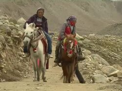 Block Shot people riding ponies Stock Footage
