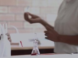 CU School girls in science class with beacons and test tubes Stock Footage