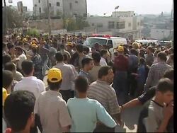 Hundreds attend funeral for Palestinian gunmen News Clip
