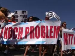 Closeup Banner 'Romney's Got A Koch Problem' Stock Footage