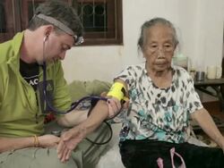Elderly laotians receive home checkups Stock Footage