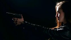 Sexy woman holding gun Stock Footage