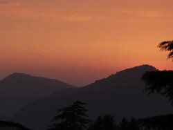 WS Sunset view of foothills of Himalayan mountains / India Stock Footage