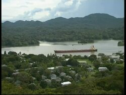 Tanker passing in the panama canal, WA, Panama, Central America Stock Footage