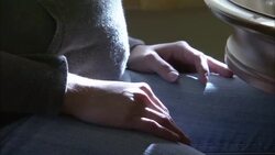 A pregnant woman takes a heroin-filled syringe from a table top. Stock Footage