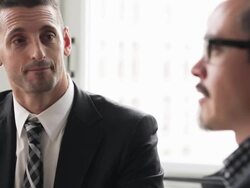 MS businessmen discussing project in office conference room Stock Footage