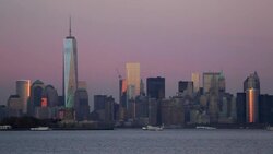 Statue of Liberty, One World Trade Center and Downtown Manhattan across the Hudson River, New York, Manhattan, United States of America Stock Footage