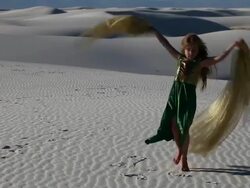MS PAN Young girl dancing in costume in white sands / Alamogordo, New Mexico, United States Stock Footage