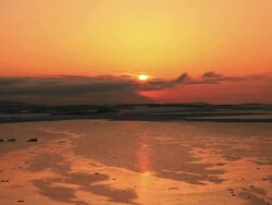WS T/L View of Sunset of Okhotsk Sea with draft ice / Nemuro, Hokkaido, Japan Stock Footage