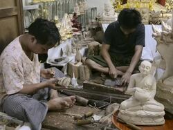 MS Wood carver make Buddha figure / Mandalay, Mandalay Division, Myanmar Stock Footage
