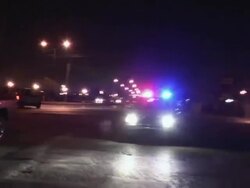 April 3 2009 WS REAR POV SHAKY Police car driving through town, Juarez, Chihuahua, Mexico, AUDIO Stock Footage