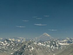 2010 AERIAL Group of gliders racing over snowcapped mountains / Santiago de Chile, Gran Santiago, Chile Stock Footage