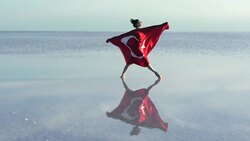 Young ballerina on the water with Turkish Flag Stock Footage