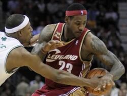 The Celtics beat Cleveland in the first game of the new NBA season Tuesday. LeBron James led the Cavaliers with 38 points. The reigning NBA champion Lakers beat the Clippers as Kobe Bryant scored 33 points. Portland and Washington also won. (Oct. 28) News Clip