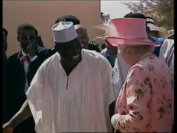 British Queen visits mock village, MacKinnon soundbite News Clip