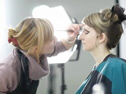 Woman getting make up on Stock Footage