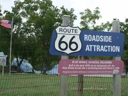 MS Shot of Route 66 roadside attraction sign for Blue Whale of Catoosa / Catoosa, Oklahoma, United States Stock Footage