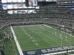  WS Players, cheerleaders, and fans all standing for National Anthem at Cowboys Stadium / Arlington, Texas, United States Stock Footage
