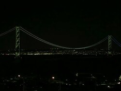 WS Shot of Night view of Akashi Kaikyo Bridge, longest central span of any suspension bridge in world / Awaji, Awaji Island, Japan Stock Footage