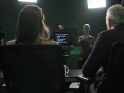 Tv presenters and crew in television studio Stock Footage