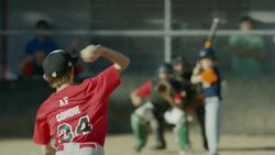 Wide slow motion shot of baseball pitcher striking out batter / American Fork, Utah, United States Stock Footage
