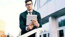 Using tablet outside of work Stock Footage