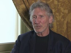 INTERVIEW - Roger Waters on how they managed the stage show for 'The Wall' when they first toured compared to the recent tour, the advice from Mark Fisher on the stage design at Roger Waters Interview Stock Footage