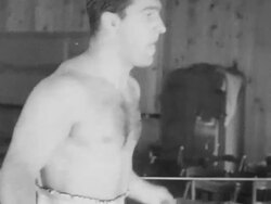 Rocky Marciano training for boxing match against Ezzard Charles Stock Footage
