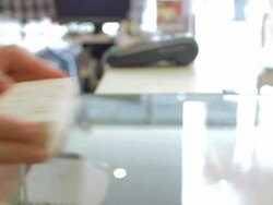 Customer to pay money for goods with the cashier Stock Footage