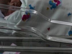 Newborn babies in a row in nursery Stock Footage