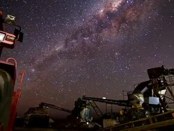 MS TS T/L View of machinery at night / Queensland, Australia Stock Footage