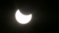 Solar Eclipse Begins on West Coast News Clip
