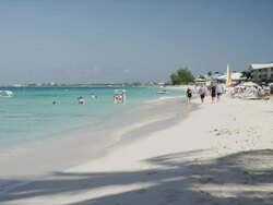 Cayman Islands, Grand Cayman, Seven Mile Beach, People at tropical beach Stock Footage