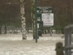 Flood Water Flowing Through Car Park News Clip