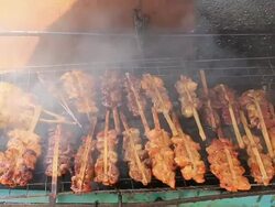 Grilling Chicken with a lot of smoke Stock Footage