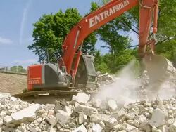 WS excavator at deconstruction of bridge over river Mosel / Wellen, Rhineland Palatinate, Germany Stock Footage