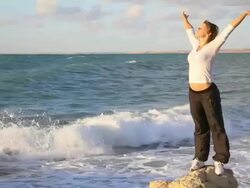 girl and a stormy sea Stock Footage